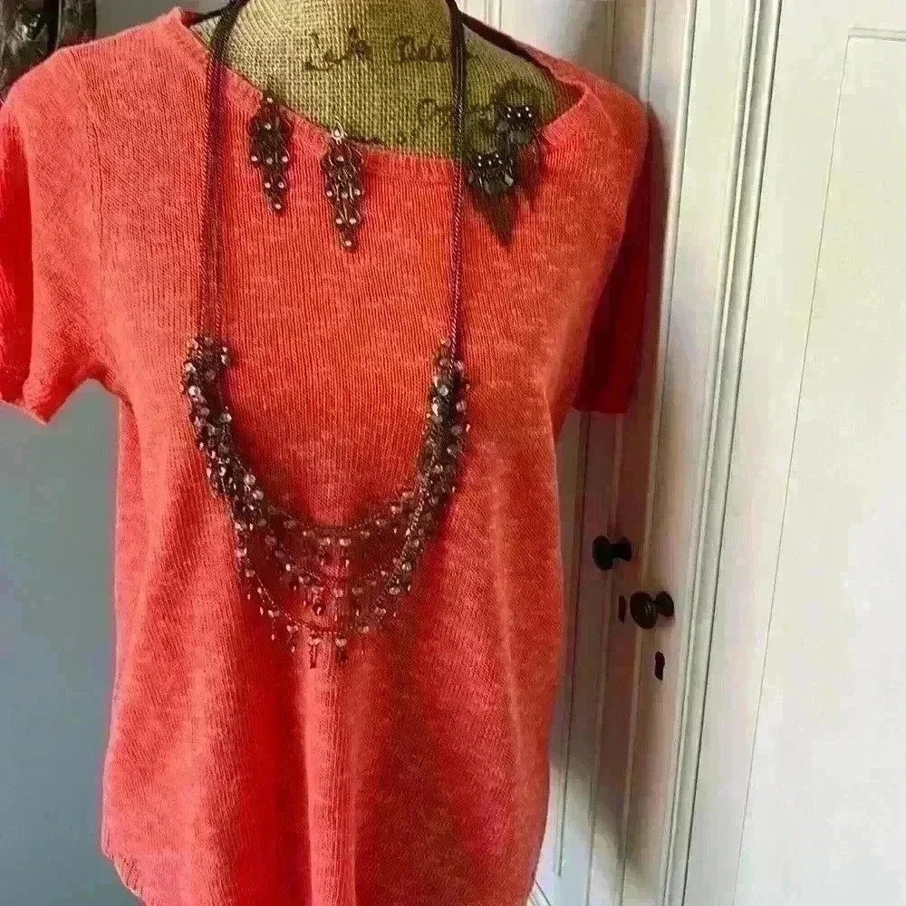 Necklace and two pairs of dangle earrings to match